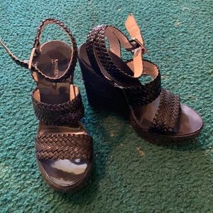 Fabulous ankle strap wedges!Some wear on lft wedge